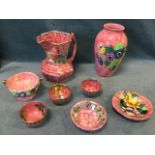 Eight pieces of pink Maling - a hexagonal peony rose lustre jug, a similar dish with pink