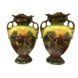 A pair of late Victorian Staffordshire vases of ovoid form applied with acanthus gilt scrolled