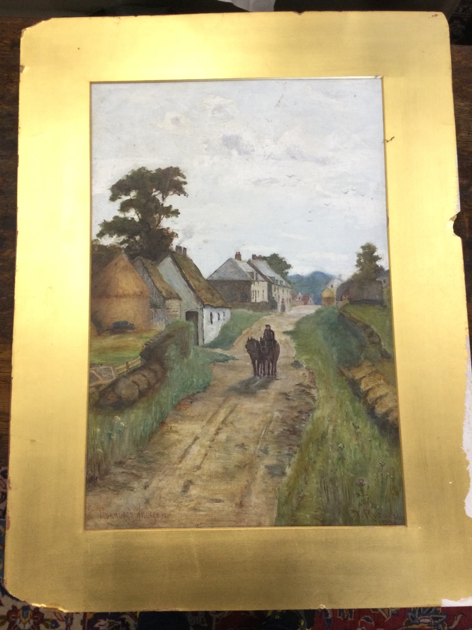 V Russell, oil on board, nineteenth century village street scene with horses and figure, titled - Image 2 of 3