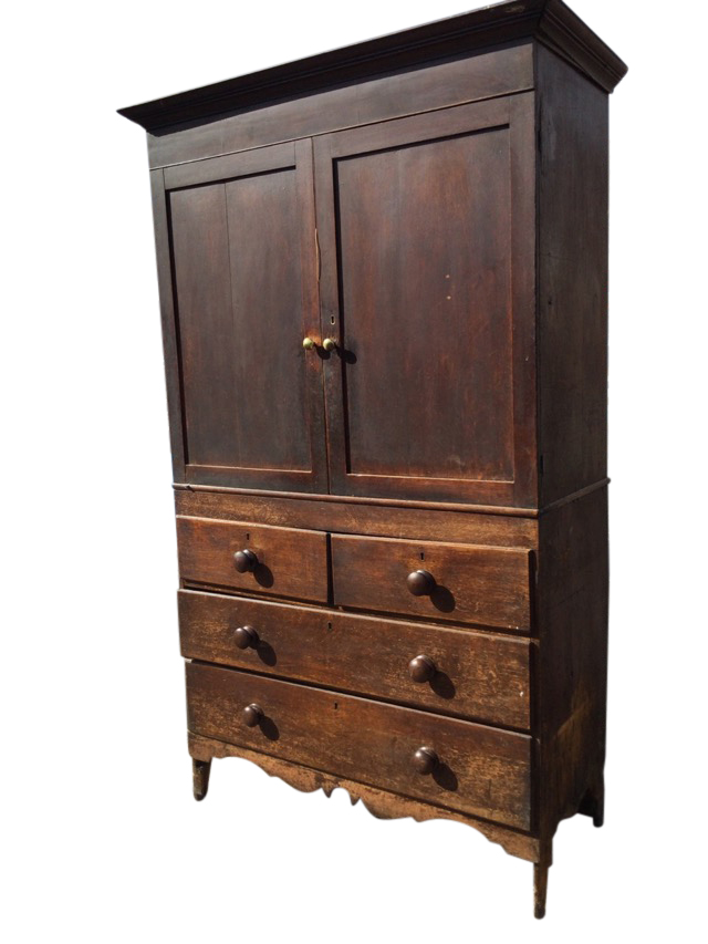 A nineteenth century oak press cupboard with moulded cornice above pair of panelled doors