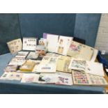 A stamp collection with nine albums, boxes and envelopes of loose stamps, first day covers,