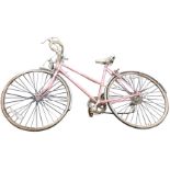 A 70s pink Raleigh Prima bicycle with aluminium drop handlebars, original paintwork, Weinmann
