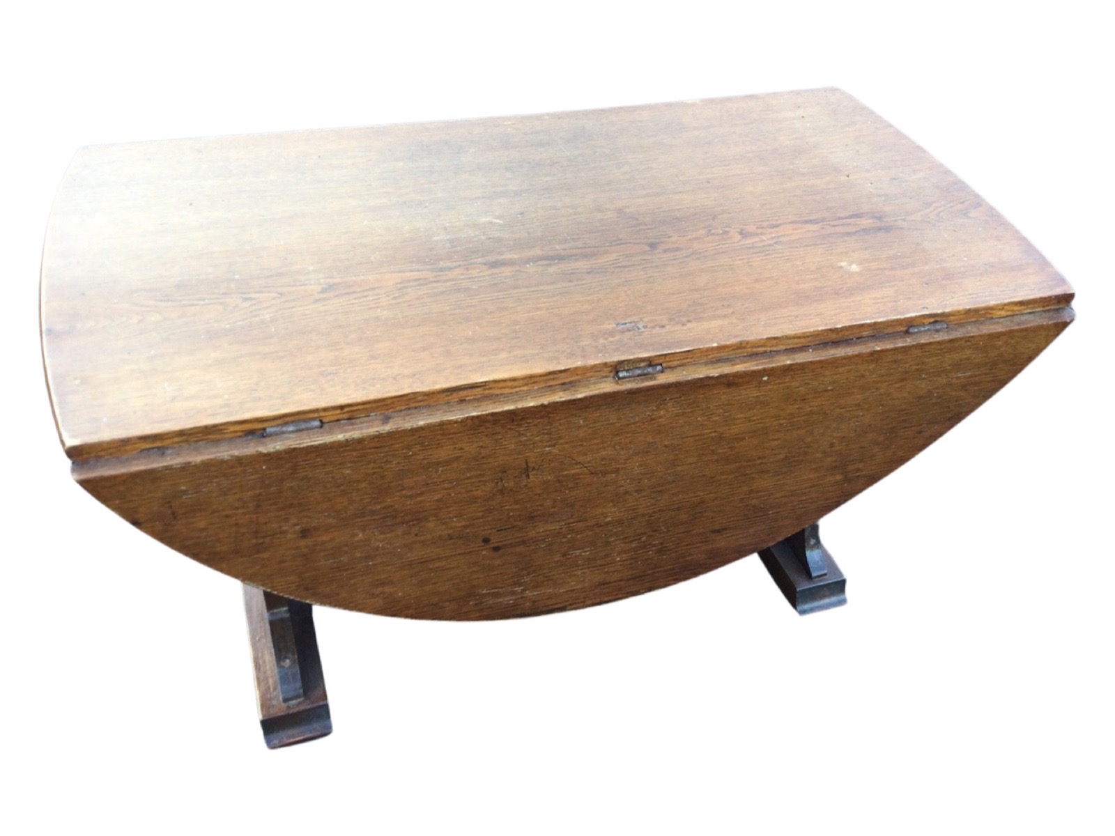 An oval oak coffee table with drop leaves on rectangular supports with batten feet, the gates with - Image 3 of 3