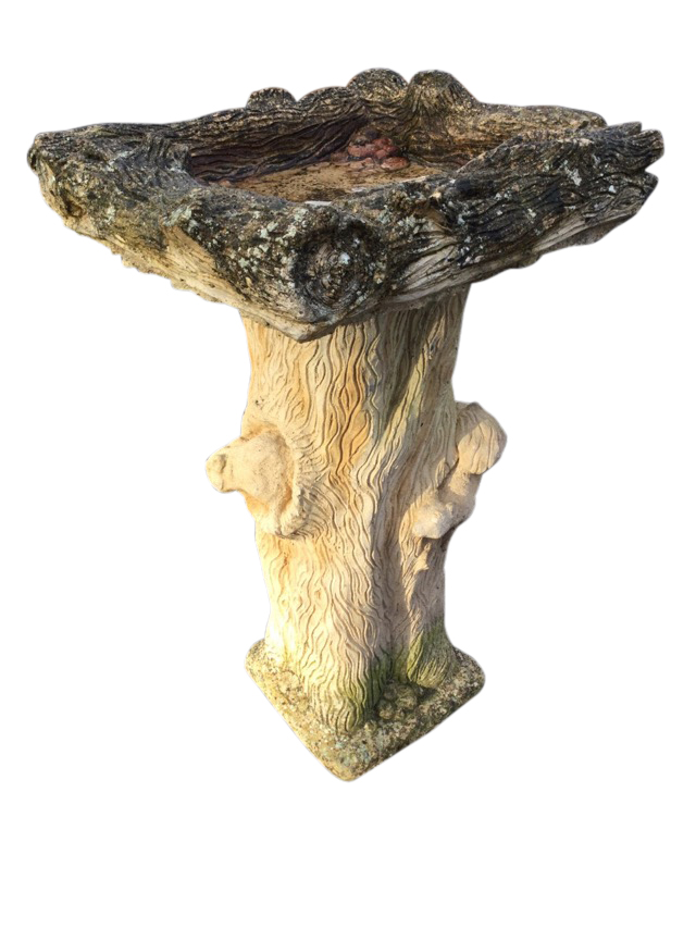A composition stone garden birdbath moulded as logs, with square bowl on column cast with squirrels.