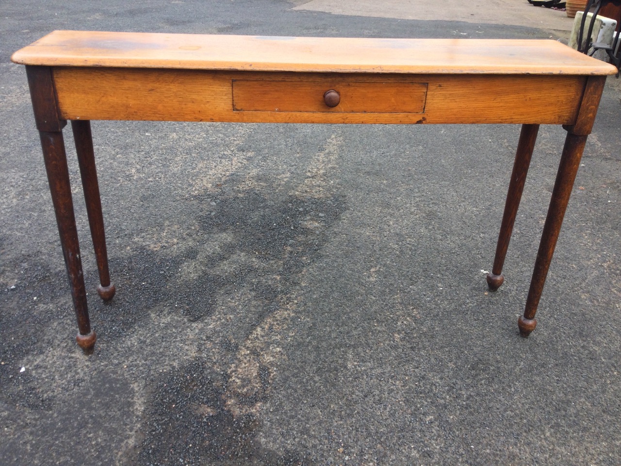 An unusual narrow oak nineteenth century hall table, the rectangular rounded top above a central - Image 3 of 3