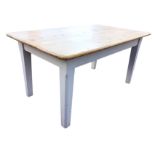 A nineteenth century 5ft pine kitchen table with later rectangular rounded top on painted base,