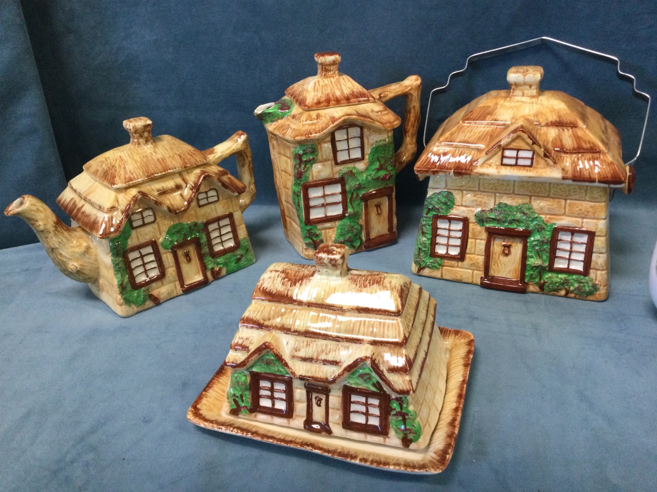 A four-piece Staffordshire cottage teaset with thatched covers; a Maling ribbed peony bowl on - Image 2 of 3
