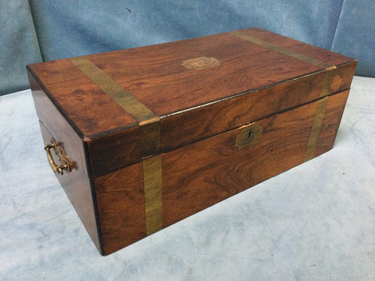 A Victorian walnut writing box with brass banding and escutcheon, having ebonised corner mouldings - - Image 2 of 3