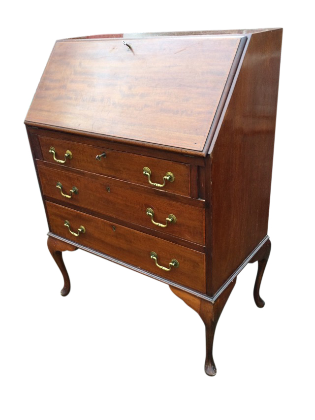 An Edwardian mahogany bureau decorated with satinwood banding, the fallfront enclosing a fitted