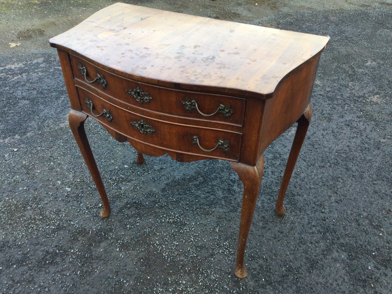 A nineteenth century mahogany side table with shaped bowfronted top above two cockbeaded drawers and - Image 3 of 3
