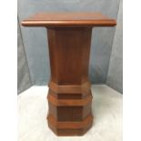 An oak lectern table or plantstand with rectangular moulded top on square canted column above an
