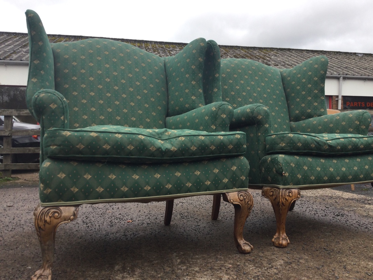 A pair of upholstered Georgian style wing-back armchairs, the wide sprung seats with loose cushions, - Image 3 of 3