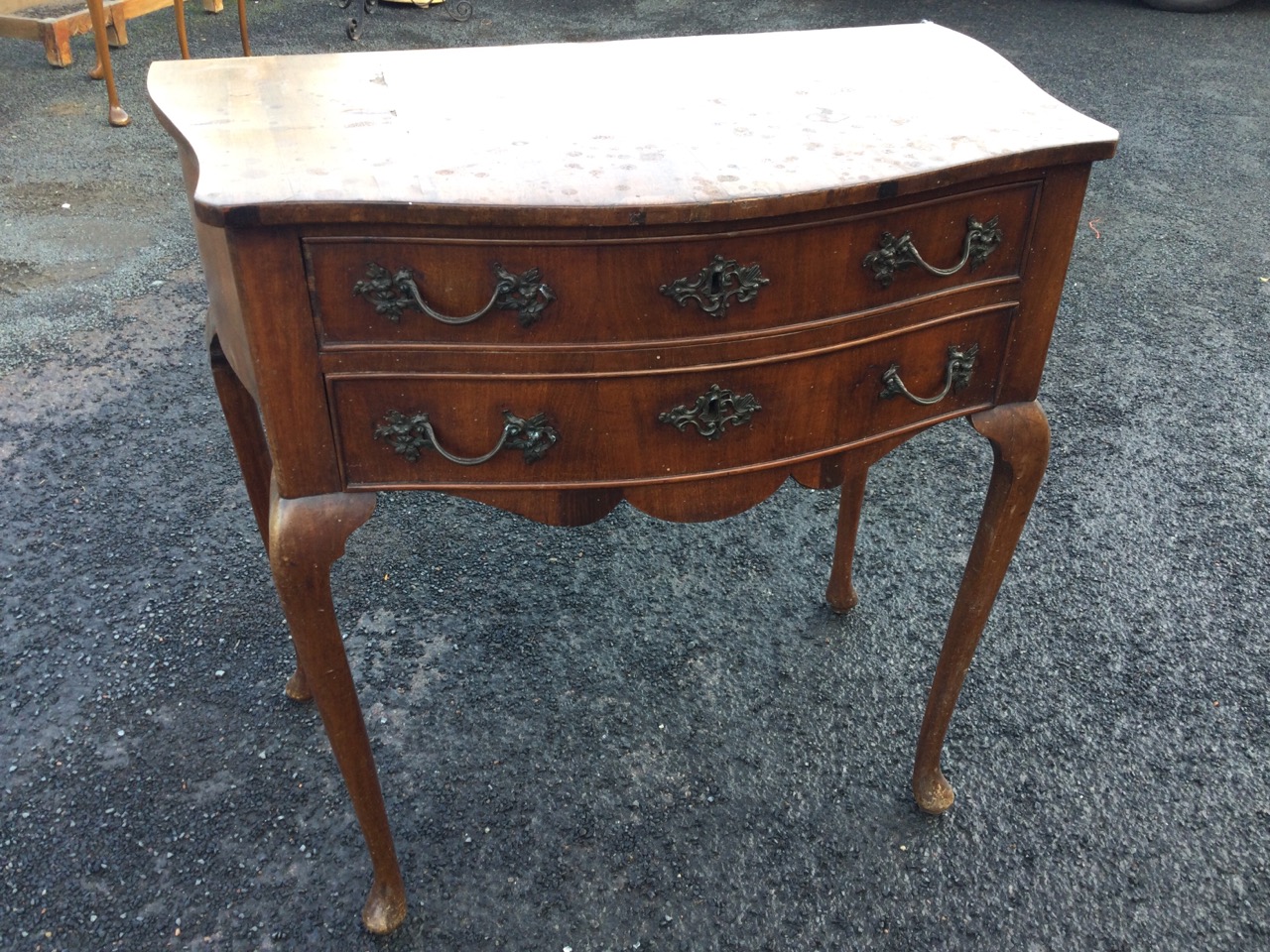 A nineteenth century mahogany side table with shaped bowfronted top above two cockbeaded drawers and - Image 2 of 3