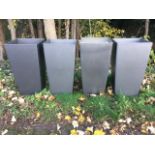 A set of four square tapering resin moulded garden pots of anthracite grey colour. (15.5in x 15.