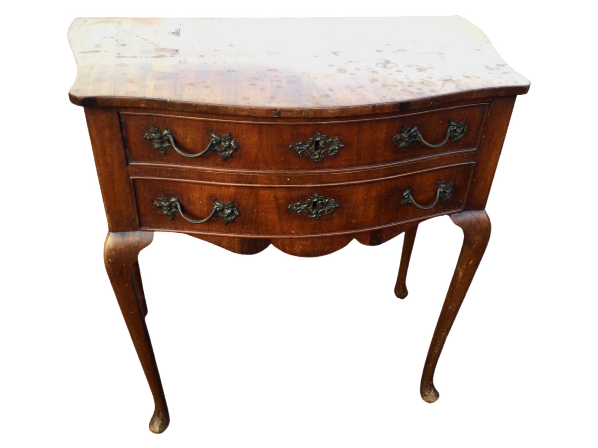 A nineteenth century mahogany side table with shaped bowfronted top above two cockbeaded drawers and