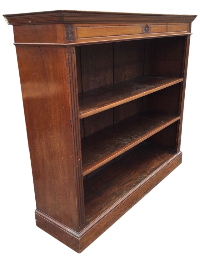 A late Victorian mahogany open bookcase, the rectangular top with moulded cornice above a panelled