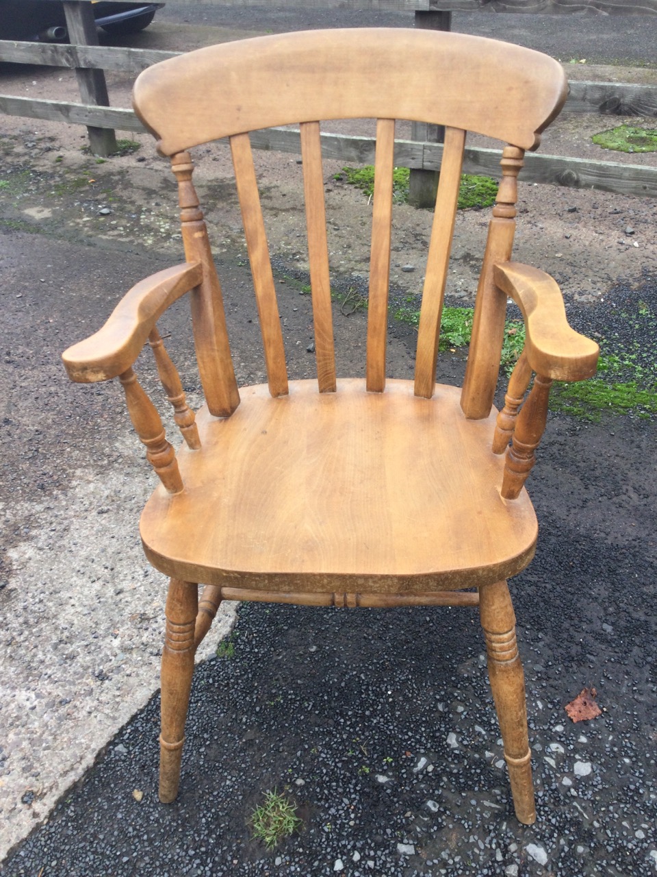 A lathe-back farmhouse armchair with shaped arms on spindles above a solid seat, raised on turned - Image 2 of 3