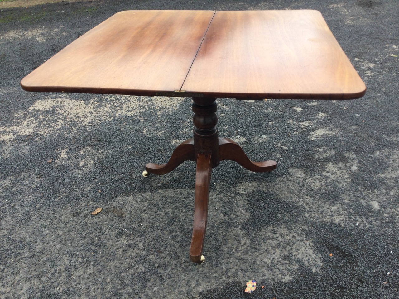 A Victorian mahogany turn-over-top tea table, the twin top supported on a turned column, with - Image 3 of 3