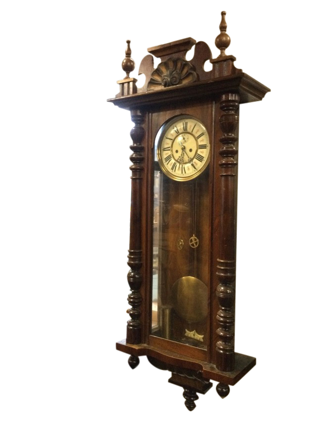A large Victorian Vienna wallclock with Gustav Becker movement, the walnut case with shell