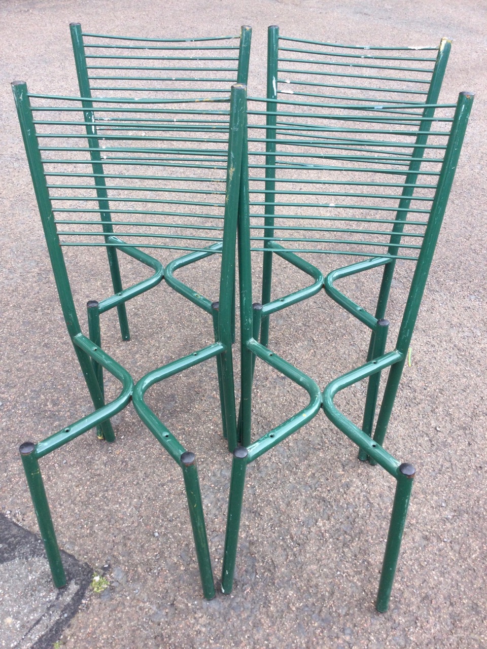 A set of four tubular metal chairs with tapering ribbed ladder backs - lacking seats. (4) - Image 2 of 3