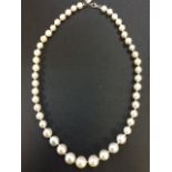 A south sea pearl necklace, the fourty-six graduated white pearls individually knotted, with