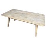 A Loaf oak coffee table with rectangular top on rounded tapering angled legs. (43.25in x 23.5in x