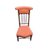 A Victorian walnut nursing chair with upholstered box compartment back rail on bobbin turned
