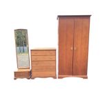 A Stag wardrobe, cheval mirror and chest of drawers, the two door robe with shelf and hanging