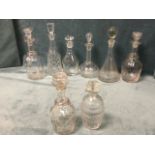 Eight miscellaneous glass decanters and stoppers - cut, sherry, mallet shaped, moulded, etc. (8)
