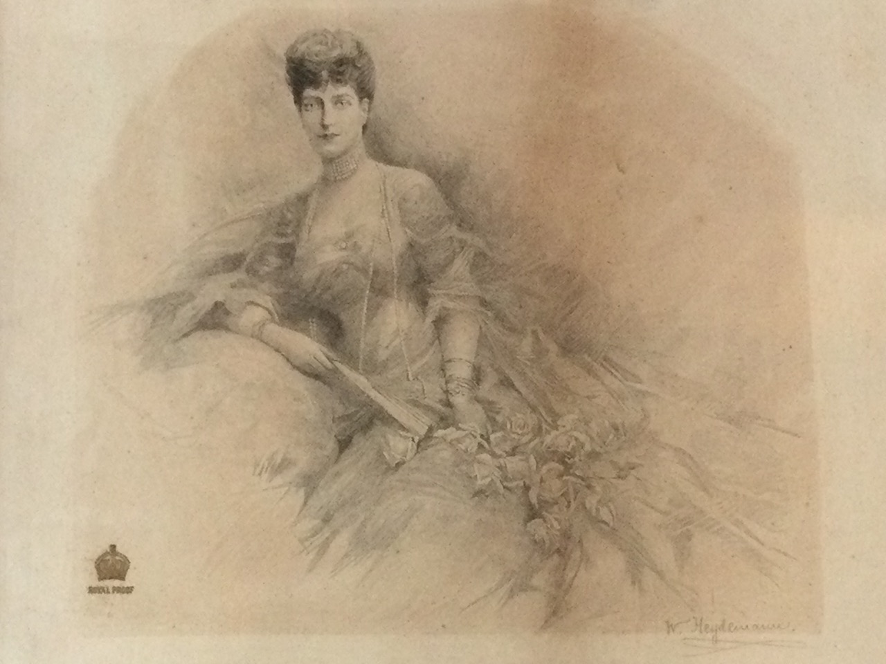 An Edwardian proof etching of Queen Alexandria by W Heydemann, the lady in repose with flowers, with