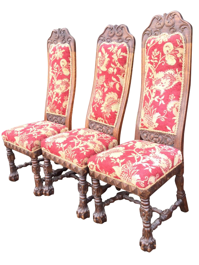 A set of three Victorian carved oak side chairs, the high backs with acanthus scrolling framing