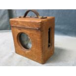 A boxed French pigeon timing clock with chromed cased timing movement in locked box having