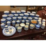 An extensive collection of TG Green blue banded Cornishware - storage jars and covers labelled