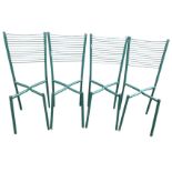 A set of four tubular metal chairs with tapering ribbed ladder backs - lacking seats. (4)