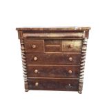 A Victorian mahogany Scotch chest with cushion moulded frieze drawer above four small drawers and
