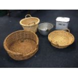 An enamelled bread bin & cover; three miscellaneous circular baskets; and an aluminium jam pan