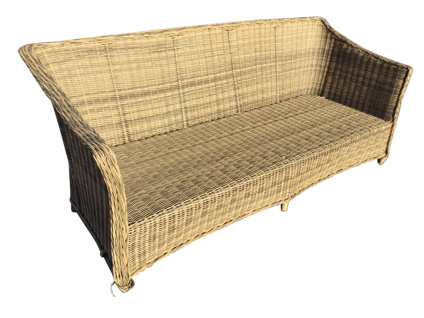 A faux cane sofa, the seat with rectangular back and downswept arms having platted trim edge, raised