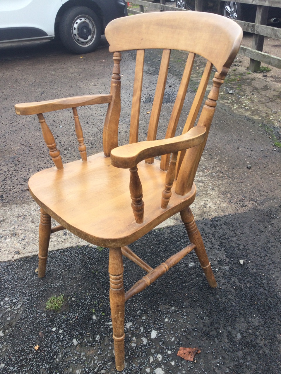 A lathe-back farmhouse armchair with shaped arms on spindles above a solid seat, raised on turned - Image 3 of 3