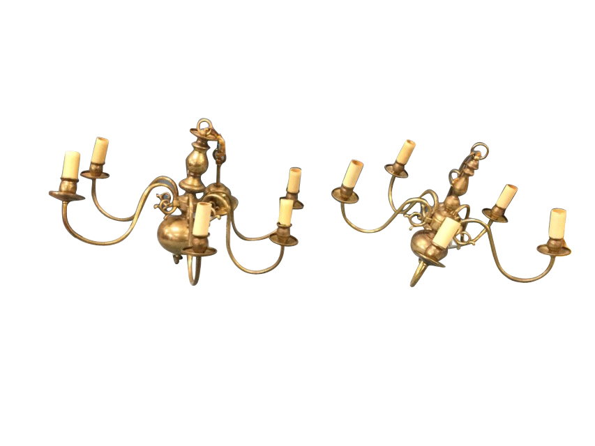 A Dutch style hanging brass light fitting with moulded cup ceiling rose above a chain supporting a