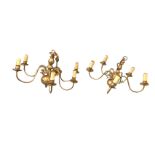 A Dutch style hanging brass light fitting with moulded cup ceiling rose above a chain supporting a