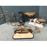 Miscellaneous silver plate including a 1928 trophy cup, candelabra, a cased serving knife & fork,