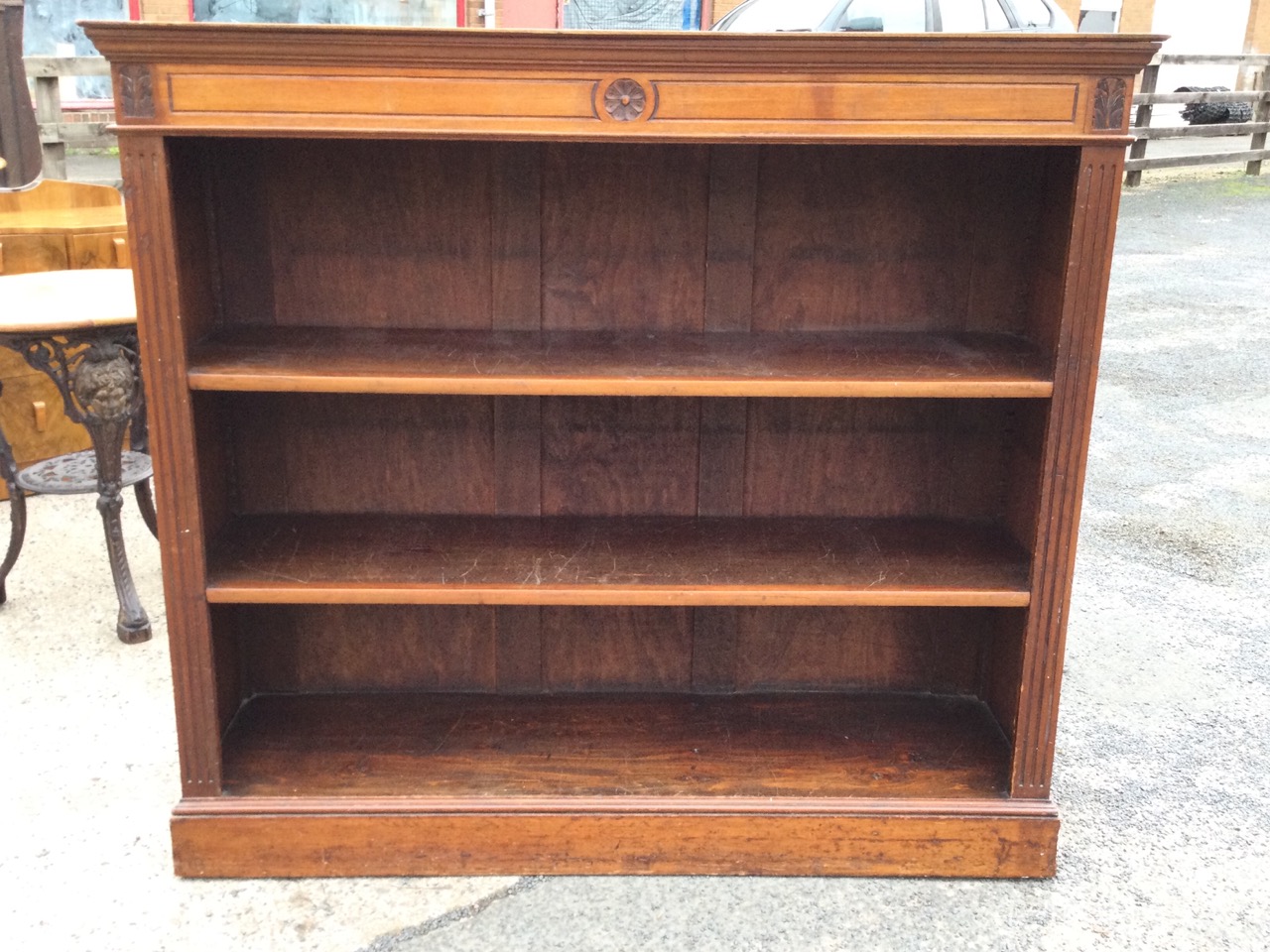 A late Victorian mahogany open bookcase, the rectangular top with moulded cornice above a panelled - Image 2 of 3