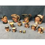 A collection of Royal Doulton character jugs in three sizes - historical, fables, Dickensian,