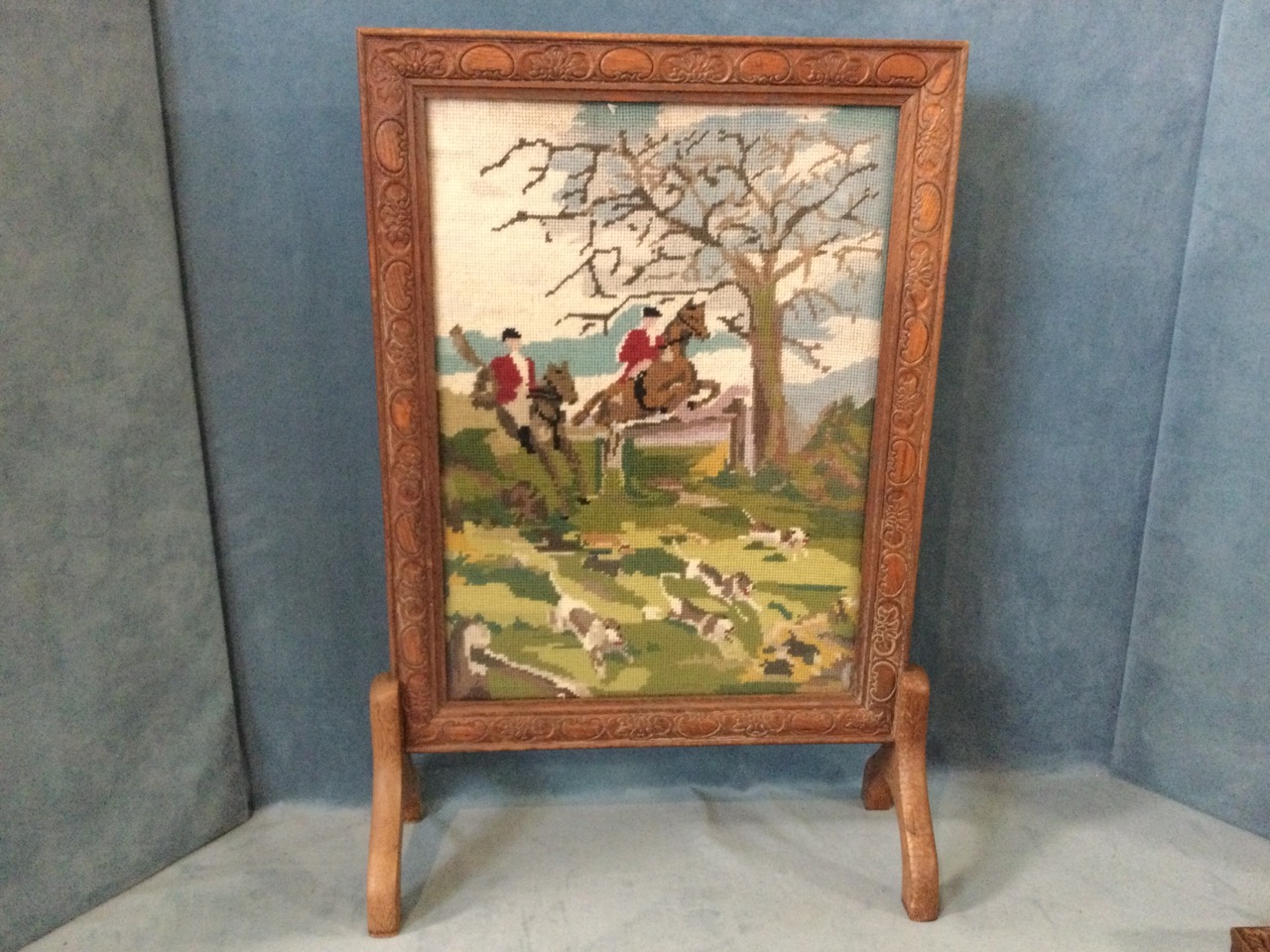 A carved oak firescreen with leaf and kidney shaped panels enclosing a woolwork tapestry hunting - Image 3 of 3