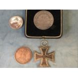Two C20th silver bulldog/bull terrier medals; a German iron cross dated 1939 beneath swastika,
