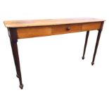 An unusual narrow oak nineteenth century hall table, the rectangular rounded top above a central
