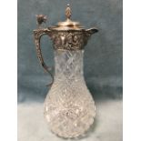 A Victorian style hobnail decorated claret jug with hallmarked silver mounts and star base, with