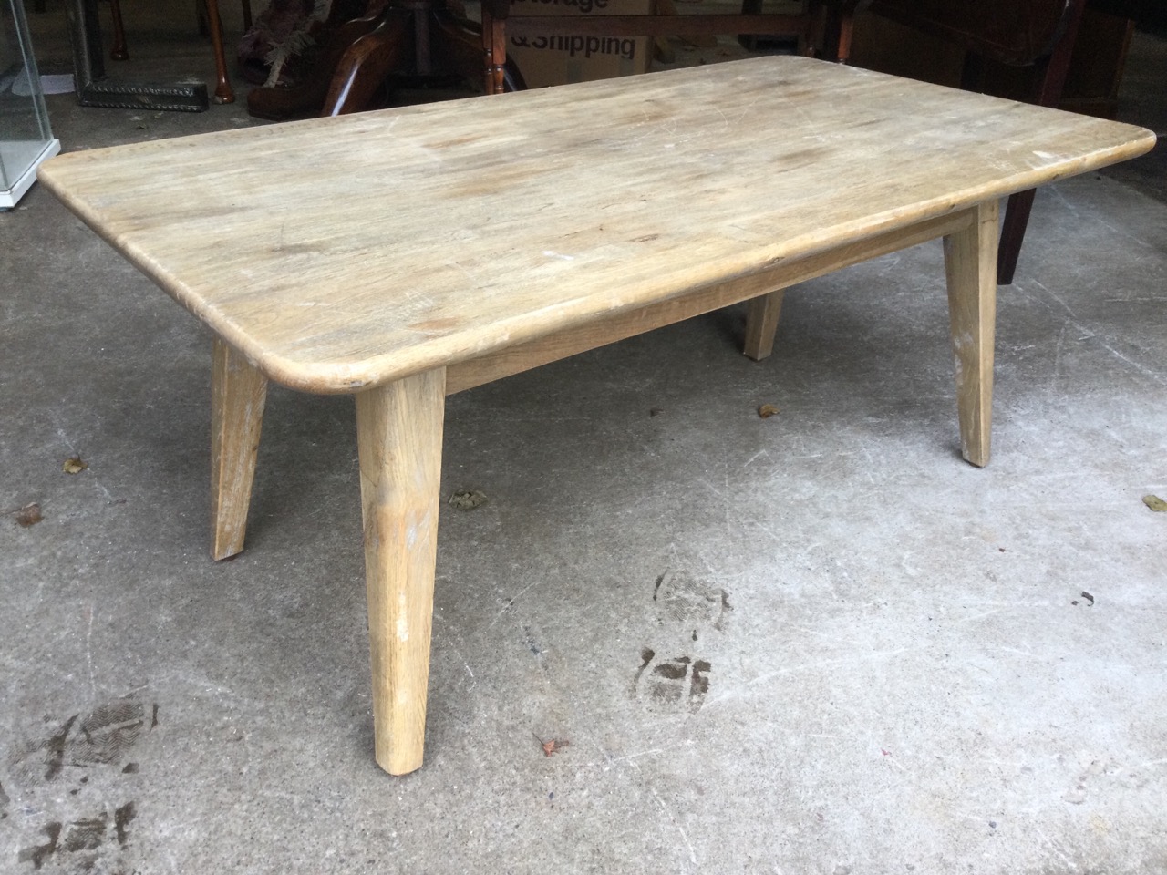 A Loaf oak coffee table with rectangular top on rounded tapering angled legs. (43.25in x 23.5in x - Image 2 of 3