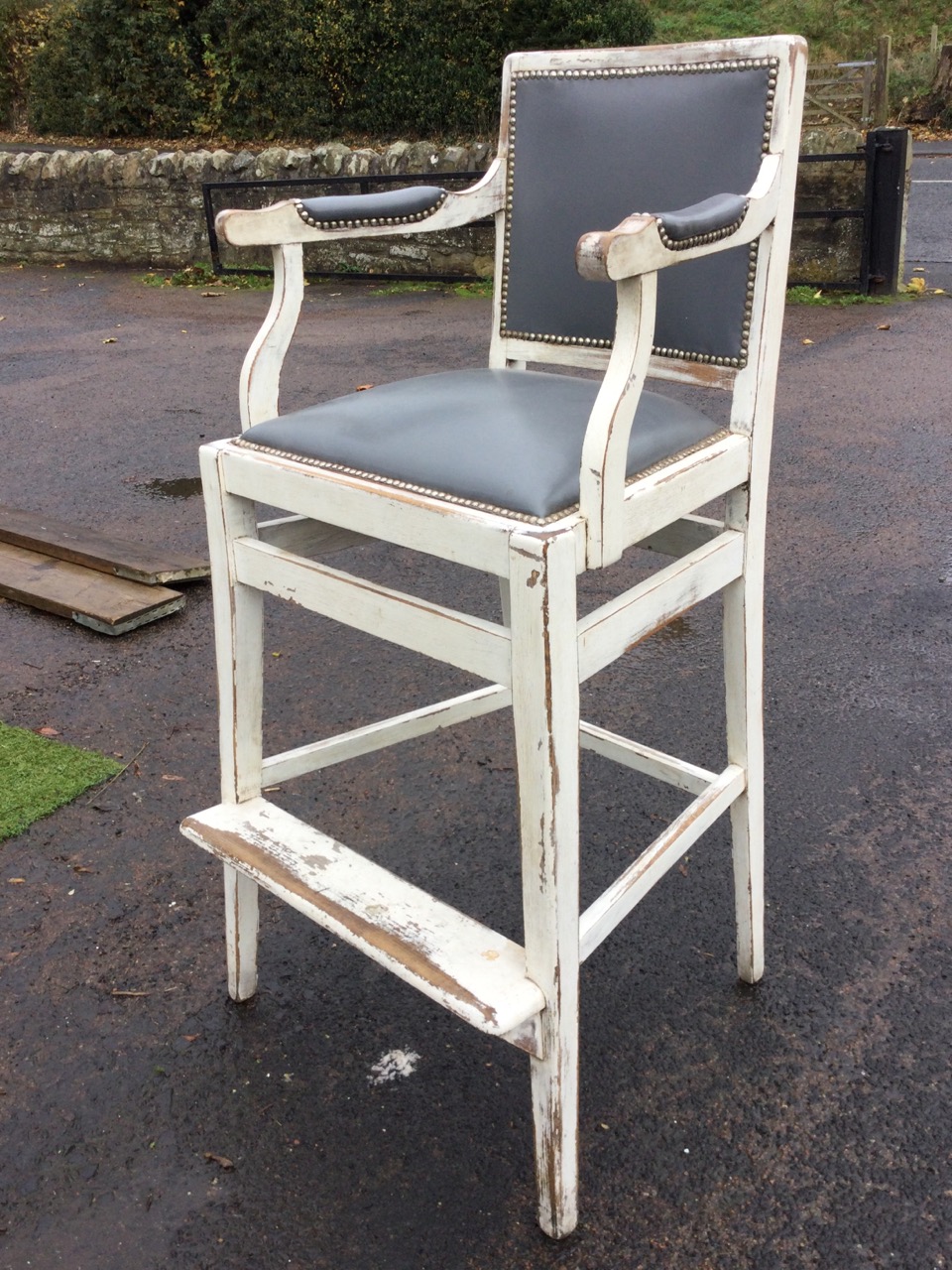 A painted high chair with leather stud upholstered back and seat, the splayed arms with elbow - Image 3 of 3