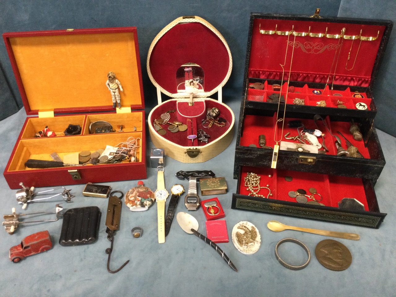 Three jewellery boxes containing miscellaneous items - coins, gilt chains, ornaments, rings, a Dinky